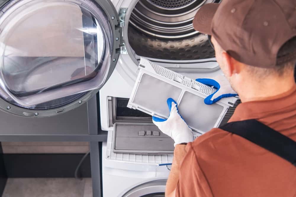 Lint removal service from dryer vent system in residential Alabama home Lint removal service from dryer vent system in residential Alabama home